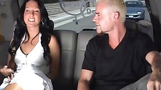 Destiny St. Claire moans while being fucked in the back of a car